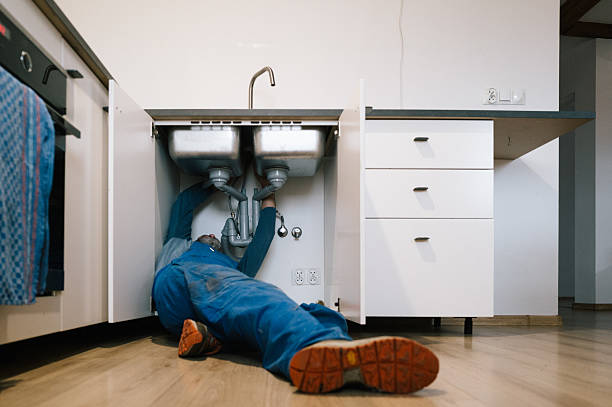 Professional Emergency Plumber technician working in Ada, OH